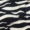 Color: Black/Cream Waves