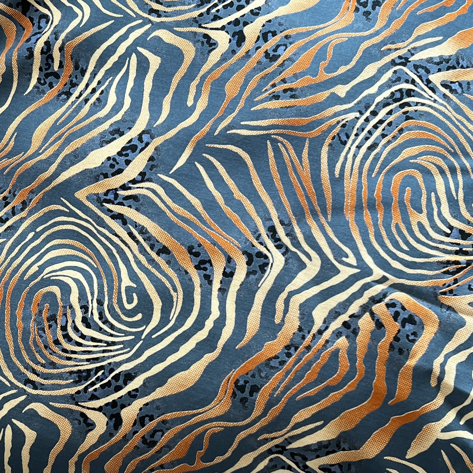 Color: Teal/Mustard Animal