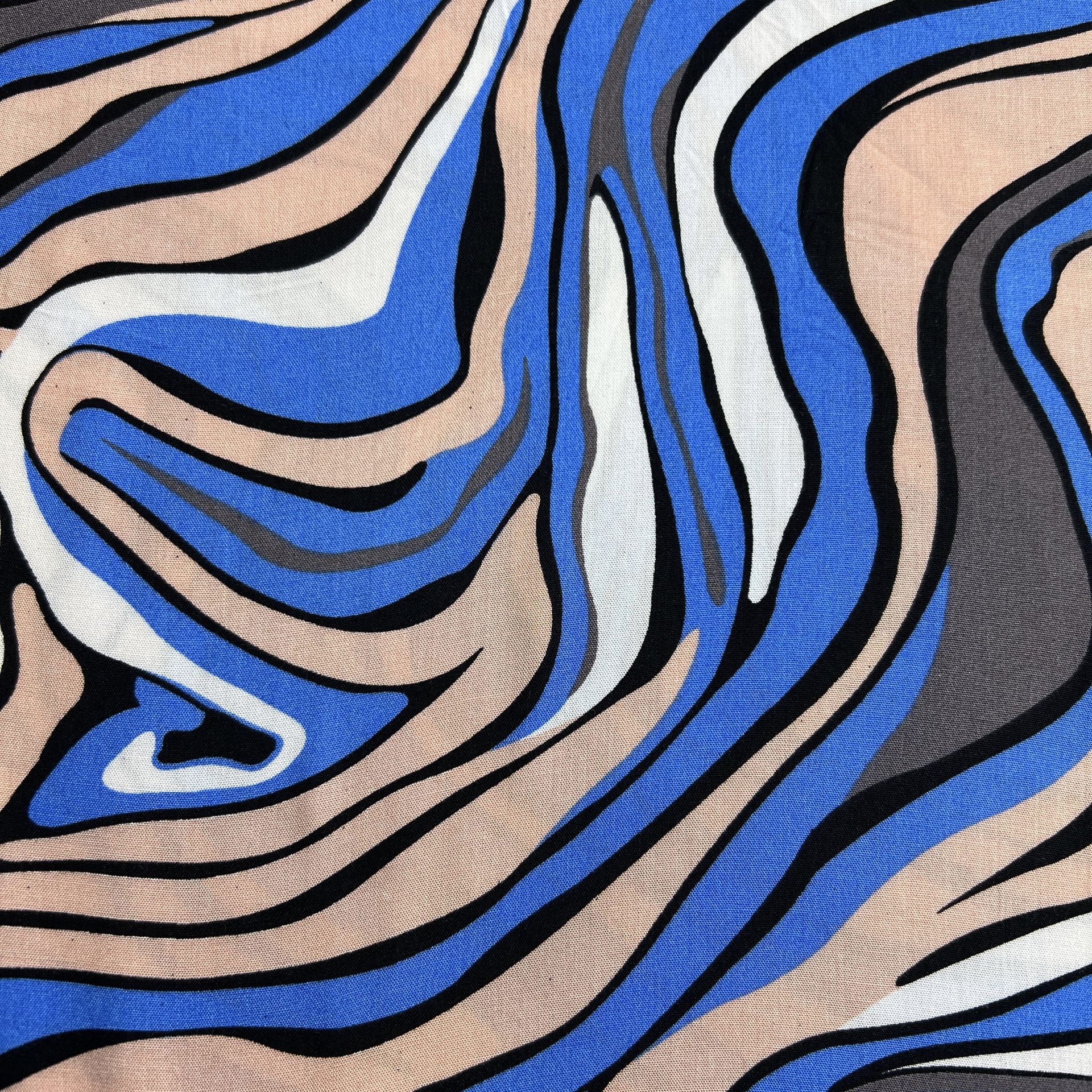 Color: Light Blue/Peach-White Waves