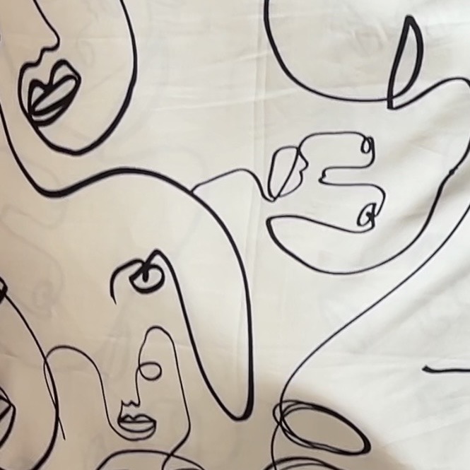 Color: Off White/Black Lined Faces