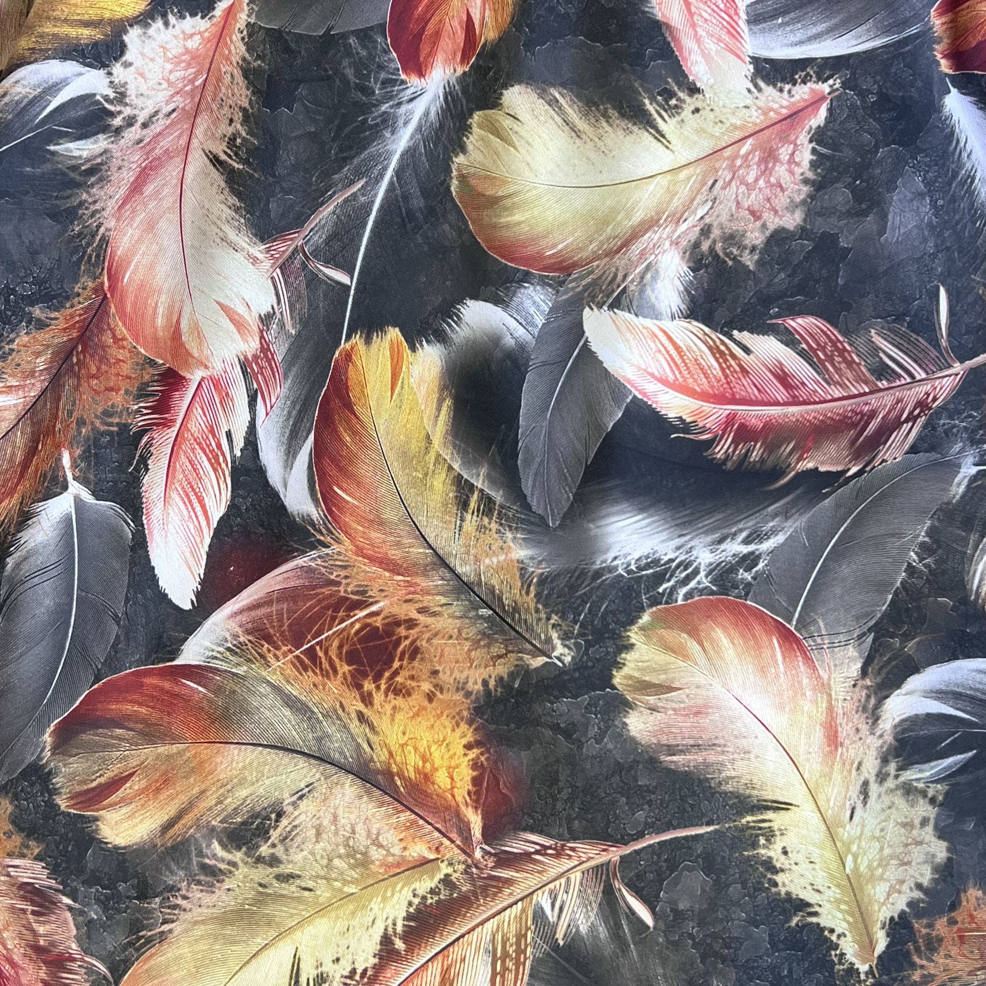 Color: Black/Orange Feathers